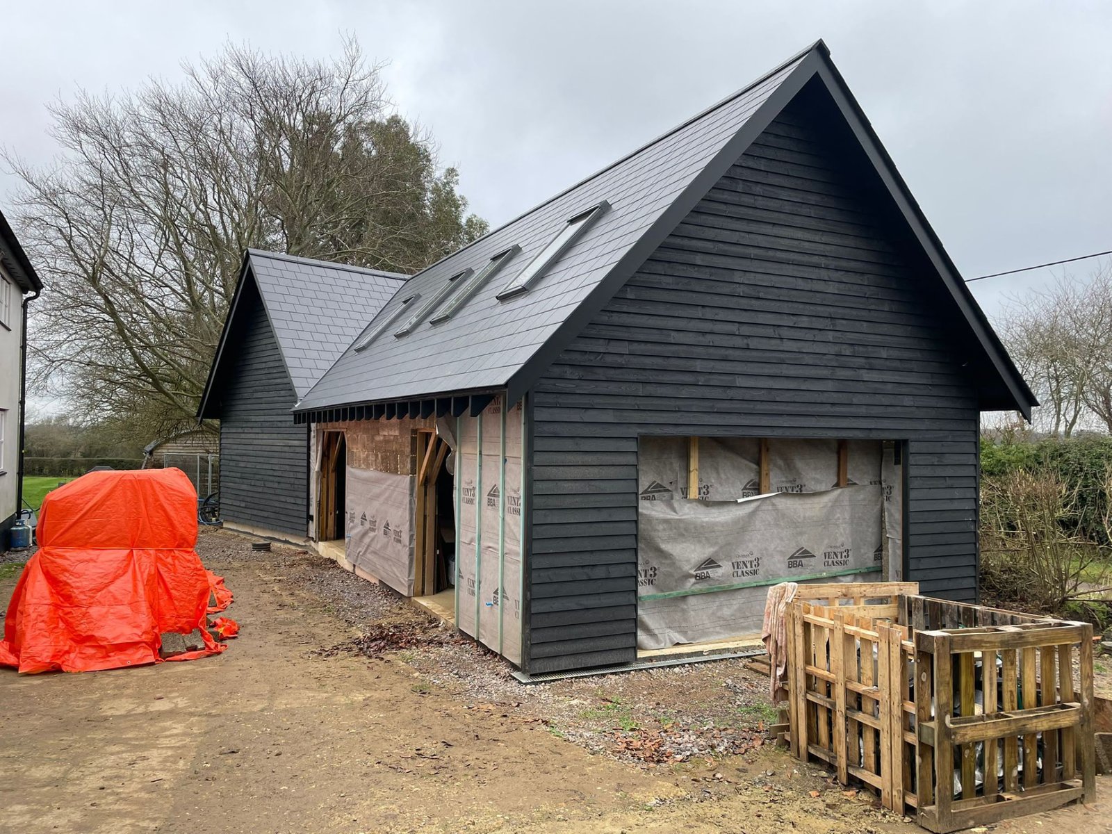 Completed black timber clad outbuilding at Buntingford